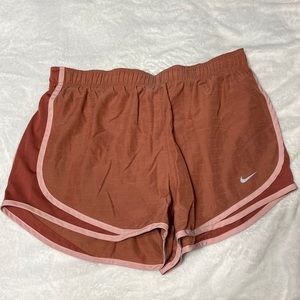 Salmon Nike shorts